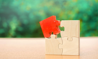 One wooden puzzle is different from the rest. Individual opinion concept. Stand out from the crowd....