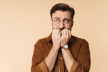 Portrait of a cheerful young arttractive bearded man