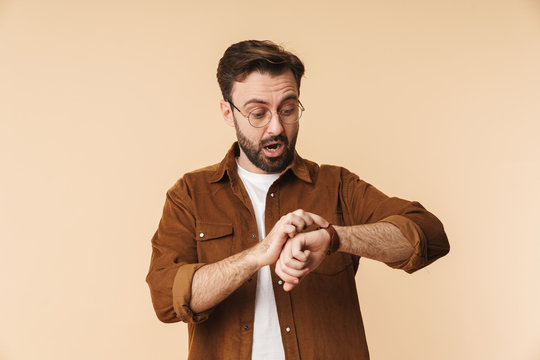 Portrait of a cheerful young arttractive bearded man