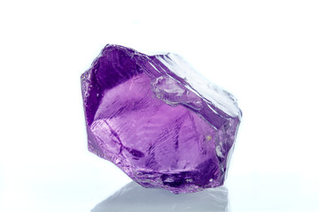 macro mineral amethyst stone on a white background