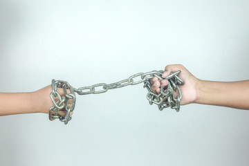 hands tied with chains