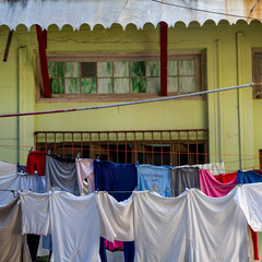 Clothes drying on clothesline outside house, Havana, Cuba
