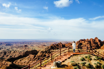 Asian girl walks among the mountains in Pingshan Lake Valley