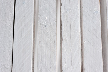Several squared timber painted in a nice white showing its differnt structures from cutting it