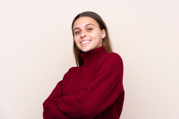 Fototapeta premium Teenager girl over isolated background laughing