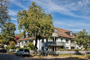 Fototapeta na wymiar eichwalde, germany - sanierte wohnhäuser mit balkon