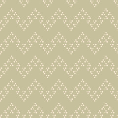 Vector green dotted zig zag lines seamless pattern background