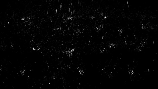 Droplets of rain falling on the surface on an isolated background