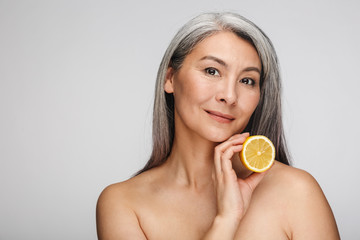 Beauty portrait of an attractive mature topless woman
