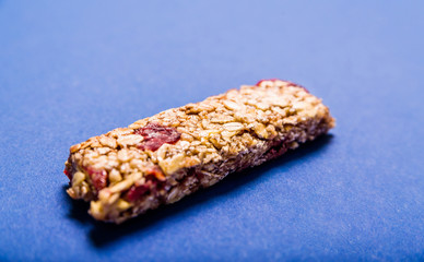 Muesli bar on a deep blue background
