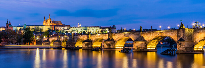 Fototapeta na wymiar Charles Bridge in Prague in Czechia. Prague, Czech Republic. Charles Bridge (Karluv Most) and Old Town Tower. Vltava River and Charles Bridge. Concept of world travel, sightseeing and tourism.