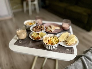 homemade breakfast on the table.  coffee and granola.