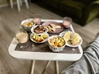 homemade breakfast on the table.  coffee and granola.