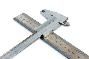ruler and vernier caliper on a white background.