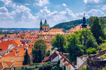 Top view to red roofs skyline of Prague city, Czech Republic. Aerial view of Prague city with terracotta roof tiles, Prague, Czechia. Old Town architecture with terracotta roofs in Prague.