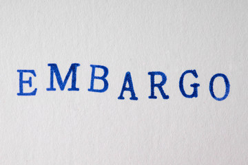 a embargo word stamped on a piece of paper.