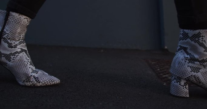 Close up view of transgender adult feet walking
