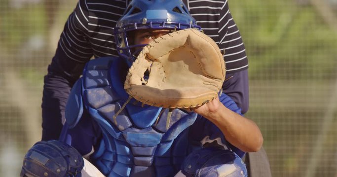 Baseball player catching a ball during a match