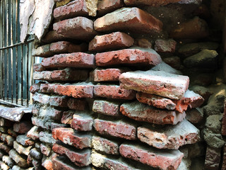 Old brick wall on a sunny day in Tbilisi.
