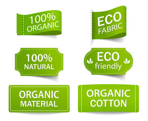Green label for eco, organic product. Natural tag for cloth. Cotton organic badge for guarantee quality. Ecofriendly textile emblem of bio material. Health care of environment concept. Textile vector.