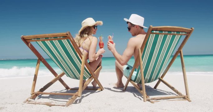 Couple in love enjoying free time on the beach together
