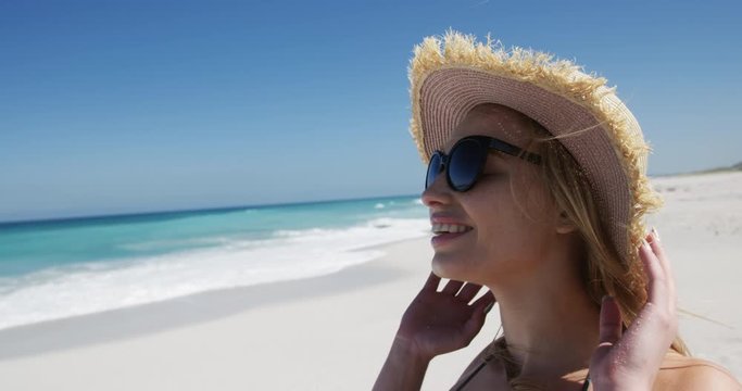 Woman enjoying free time on the beach