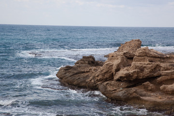 Mediterranean Sea crashing on the Rocky Shore of Caesarea Israel