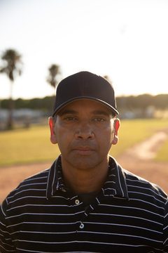 Baseball coach looking at camera