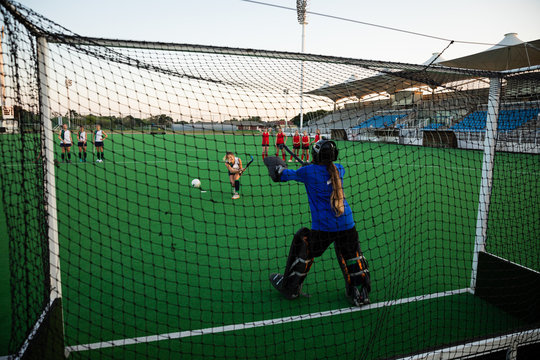 Female hockey players during the match