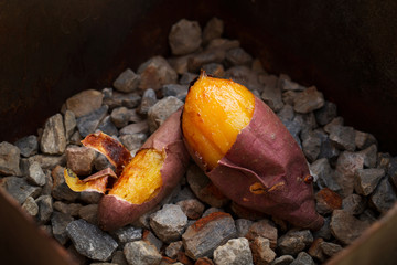 Delicious yam sweet potato roasted on stone in winter season at Japan.