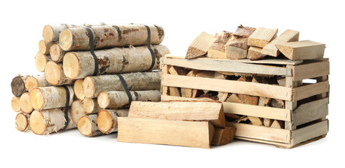 Cut firewood on white background. Heating in winter