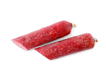 Tasty cut sausage on white background, top view. Meat product