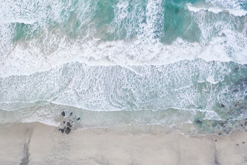 Aerial view and top view. Beautiful natural backdrop. Amazing nature background.The color of the water and beautifully bright.Azure beach with rocky mountains and clear water of Norway ocean .