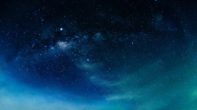 Milky way galaxy with stars and space in the universe background at thailand