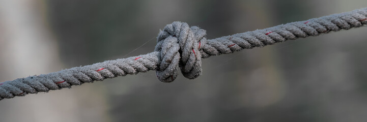 Obraz premium Large knot on a sea rope