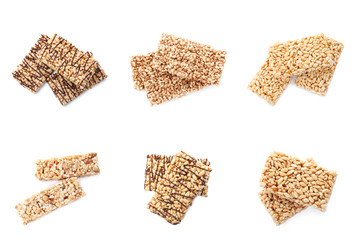Set of delicious rice crispy treats on white background, top view