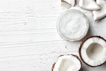 Jar of coconut oil and fresh coconut