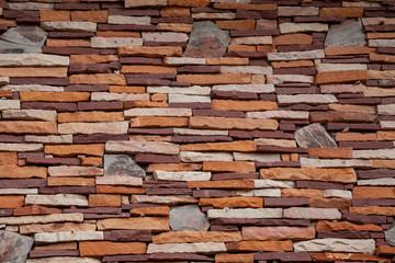 Colorful stone wall pattern background.