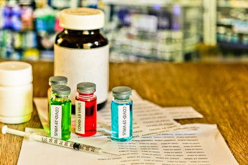  Syringe and illustrative of virus in background Medical Concept of composite photo of Corona Virus Outbreak Corona virus 2020 disease,COVID-19,nCoV