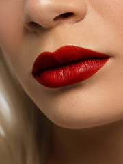 Closeup plump Lips. Lip Care, Augmentation, Fillers. Macro photo with Face detail. Natural shape with perfect contour. Close-up perfect lip makeup beautiful female mouth. Plump sexy full red lips