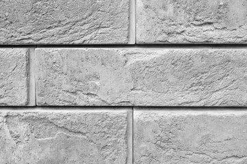 pattern of decorative gray slate stone wall surface as a background. tinted gray