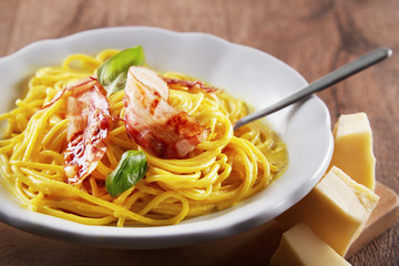 Pasta carbonara. Italian spaghetti dish in a bowl viewed from above. 