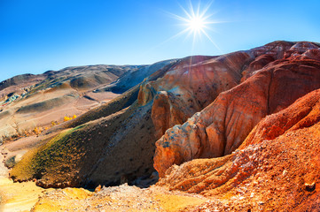 Red mountains in Kyzyl-Chin valley, also called as Mars valley. Altai, Siberia, Russia