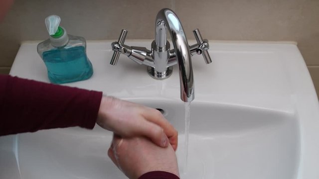 Washing hands with liquid soap for at least 20 seconds.