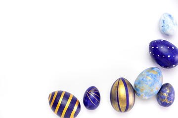 Happy Easter. Frame for text made of easter eggs trendy colored classic blue, white and golden on...