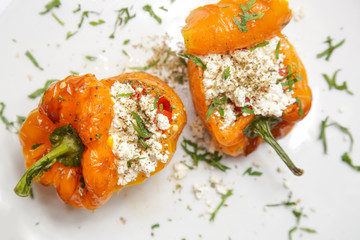 Simple vegetarian dish - bell pepper stuffed with feta cheese