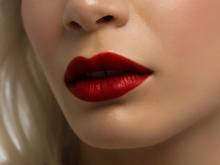 Closeup plump Lips. Lip Care, Augmentation, Fillers. Macro photo with Face detail. Natural shape with perfect contour. Close-up perfect lip makeup beautiful female mouth. Plump sexy full red lips