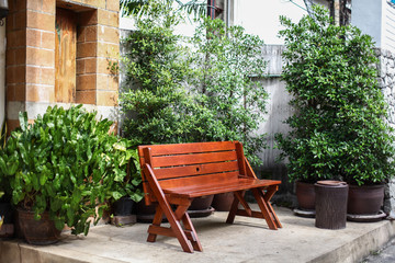 garden bench in front of a house
