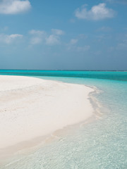 Idyllic Beach on Maldives on Meeru Island with Cloudy Sky.