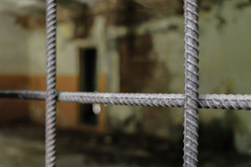 View of prison bars on foreground.